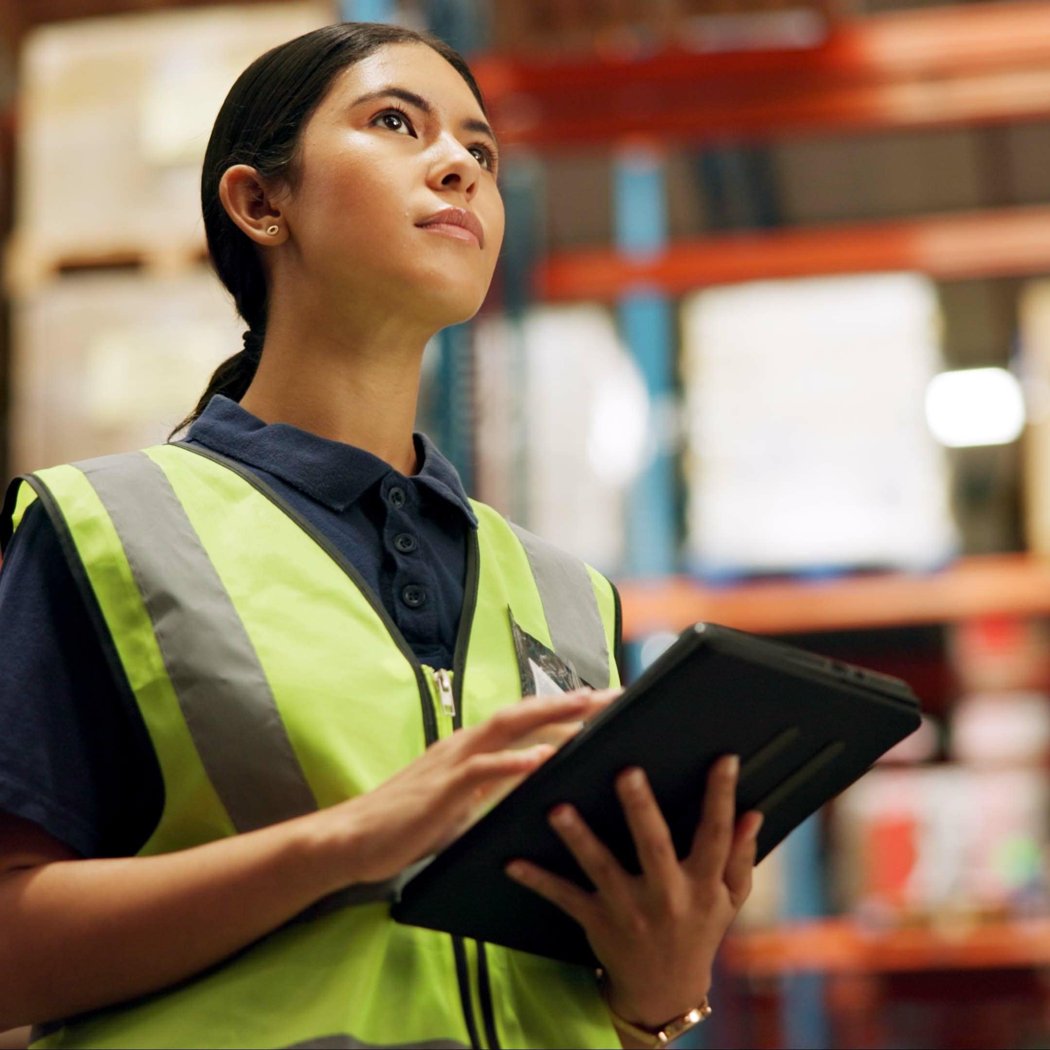Level 1 Smart Search Agent - warehouse worker using a tablet to access inventory and operational data via natural language search.